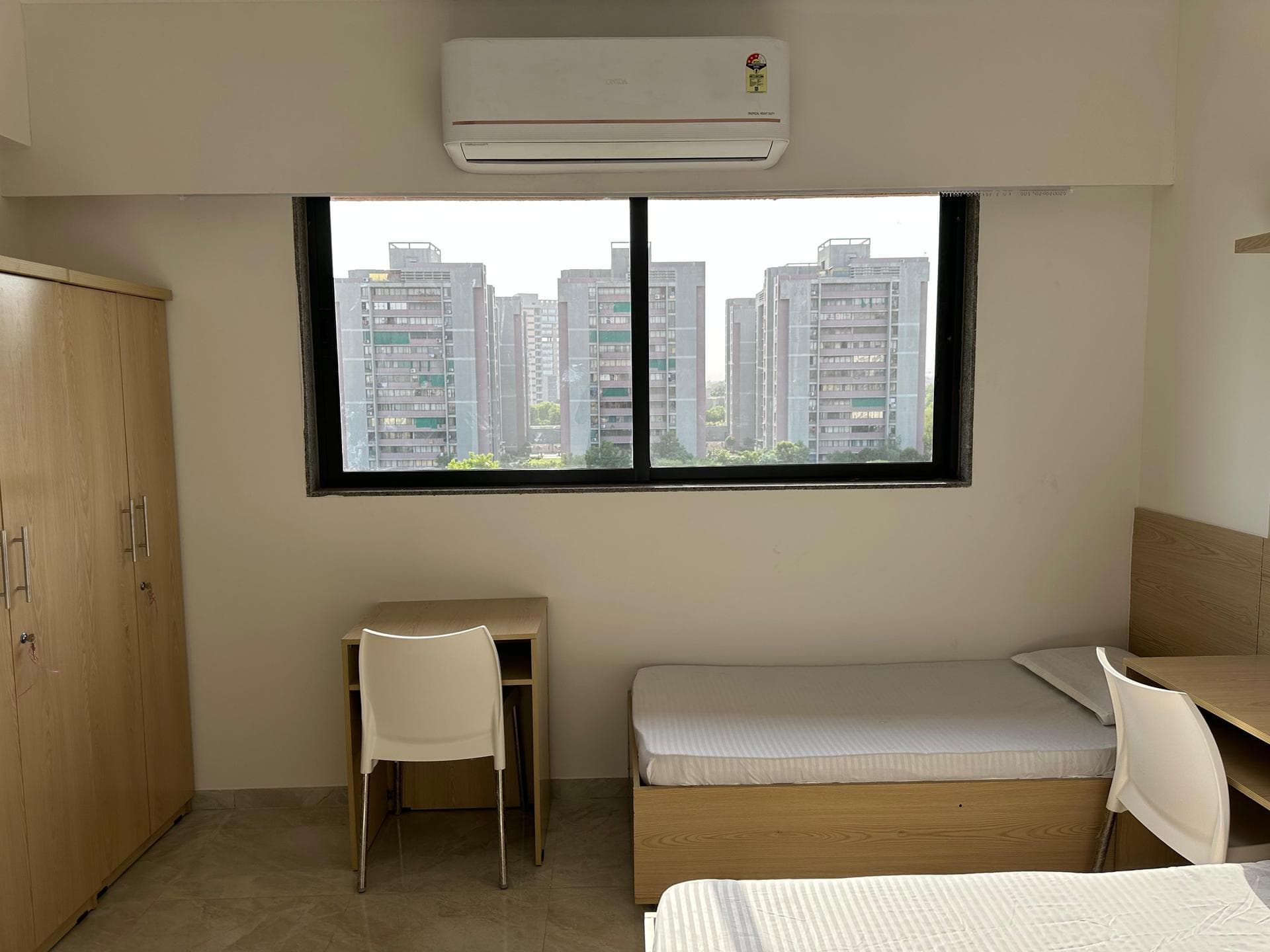 Iris Room 4 at Unoloft PG near Nirma University Ahmedabad